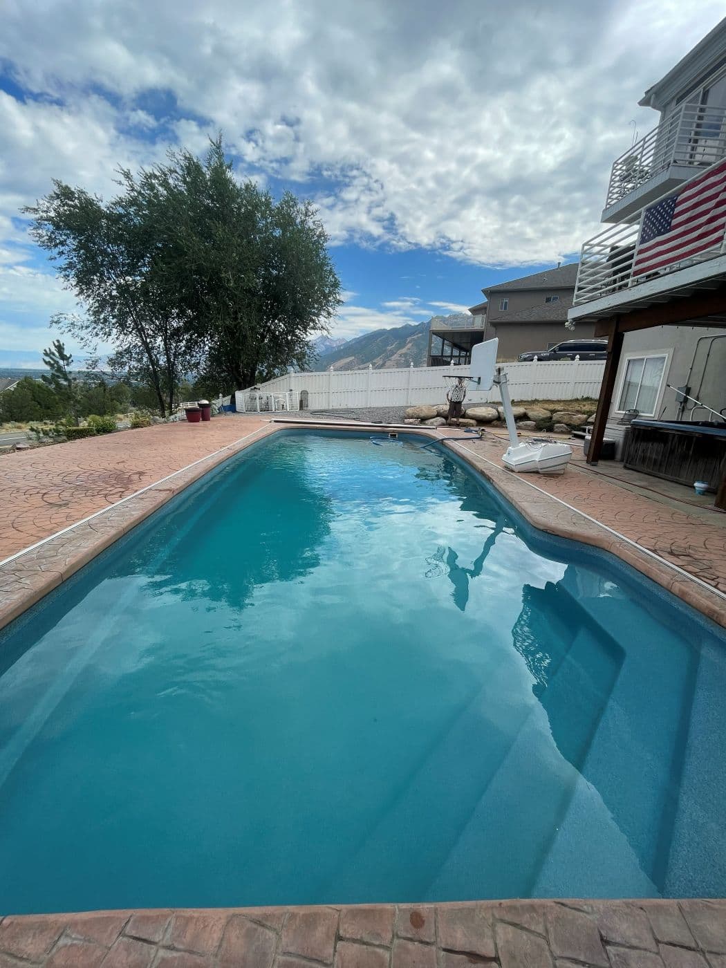 The same rectangular pool with clear turquoise water